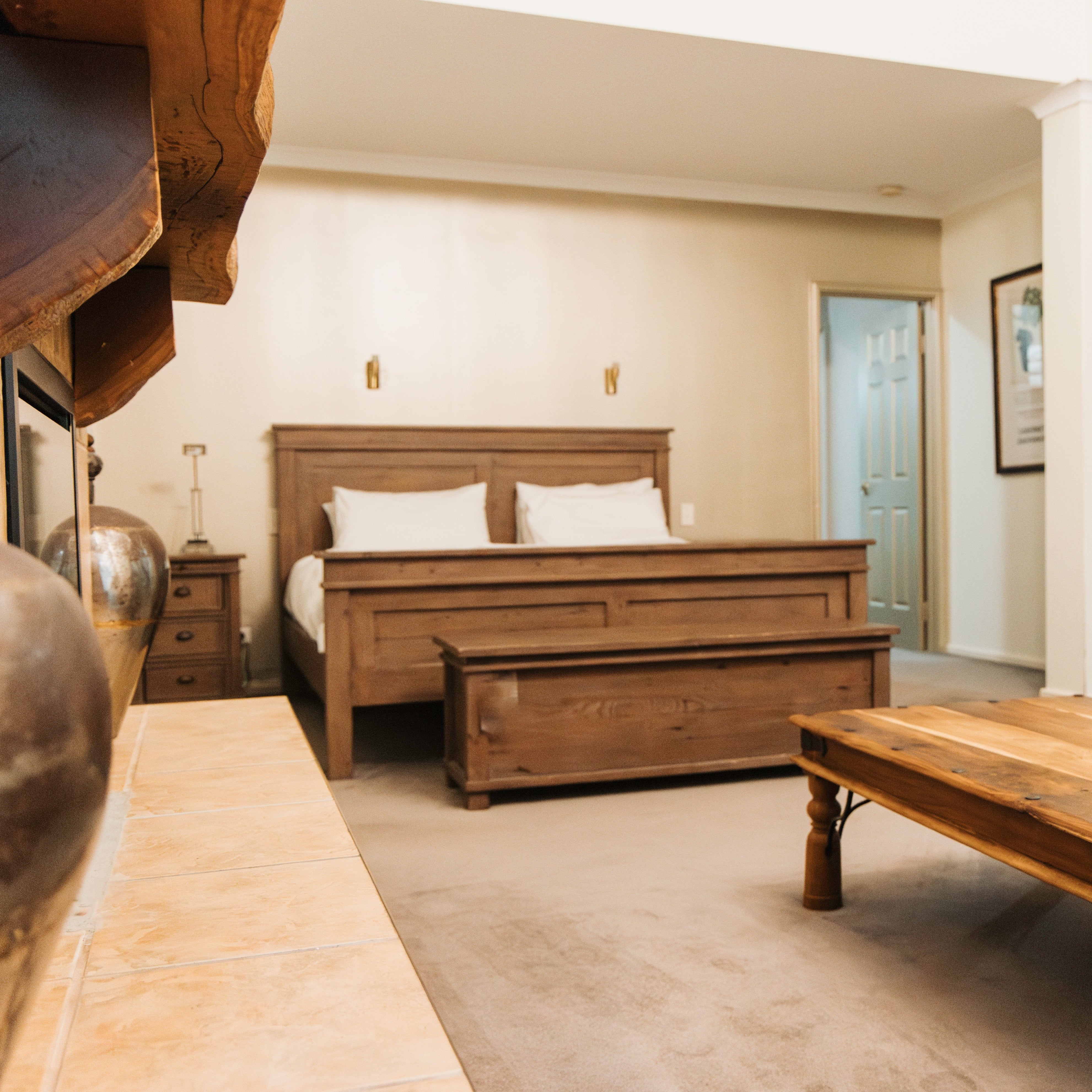 Cozy bedroom with wooden furniture and decor